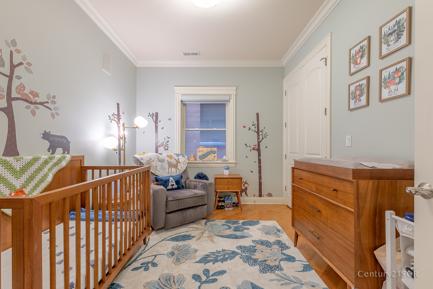 106 South Sangamon Street, Unit 2S Chicago, IL 60607 - Photo 24 of 29 a bedroom with furniture and a baby crib