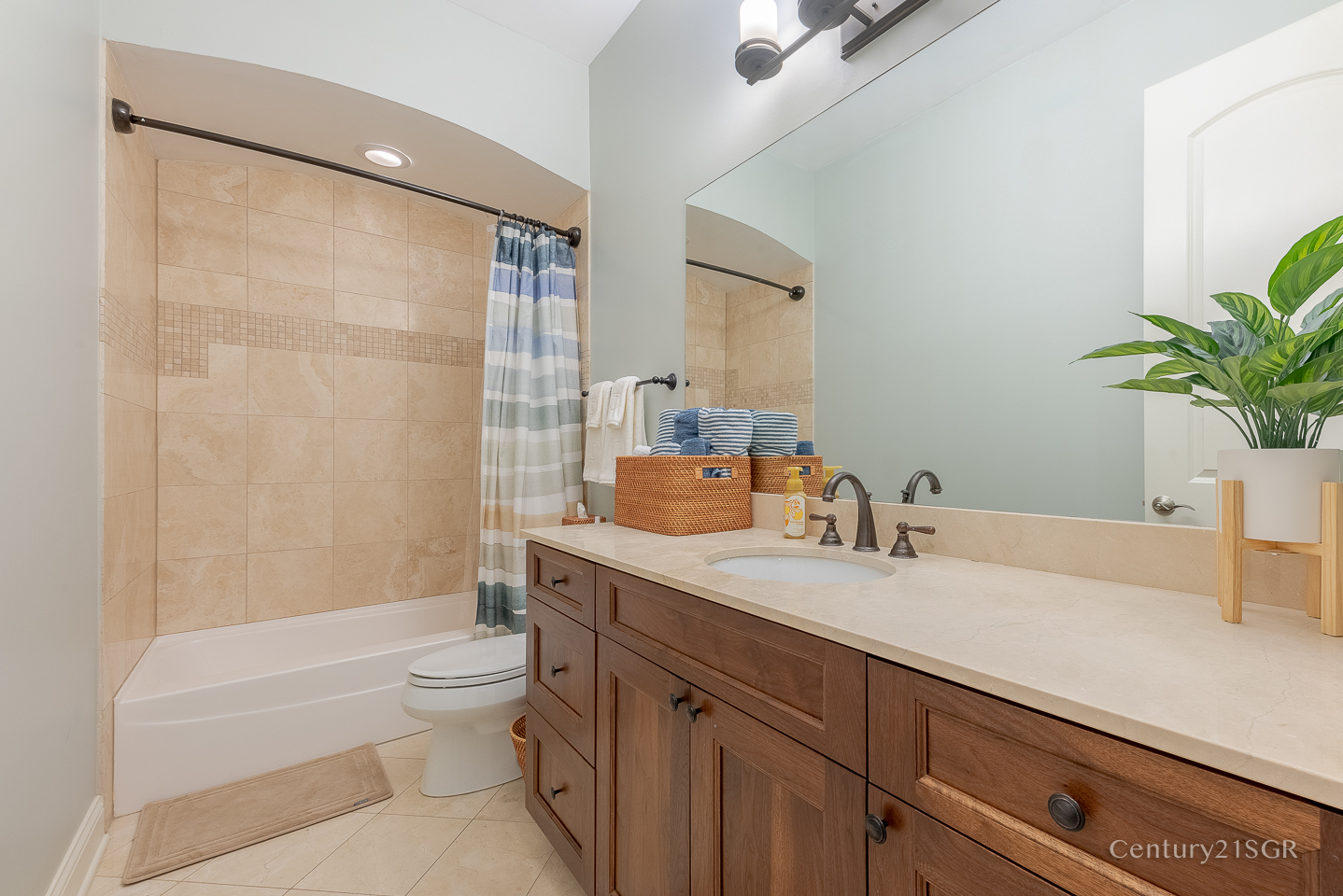 106 South Sangamon Street, Unit 2S Chicago, IL 60607 - Photo 27 of 29 a bathroom with a granite countertop sink a toilet and shower