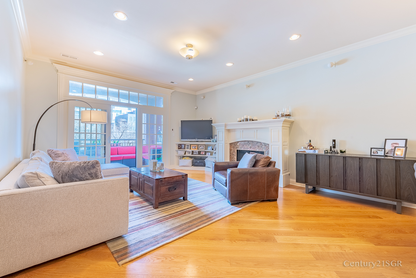 106 South Sangamon Street, Unit 2S Chicago, IL 60607 - Photo 4 of 29 a living room with furniture and a fireplace