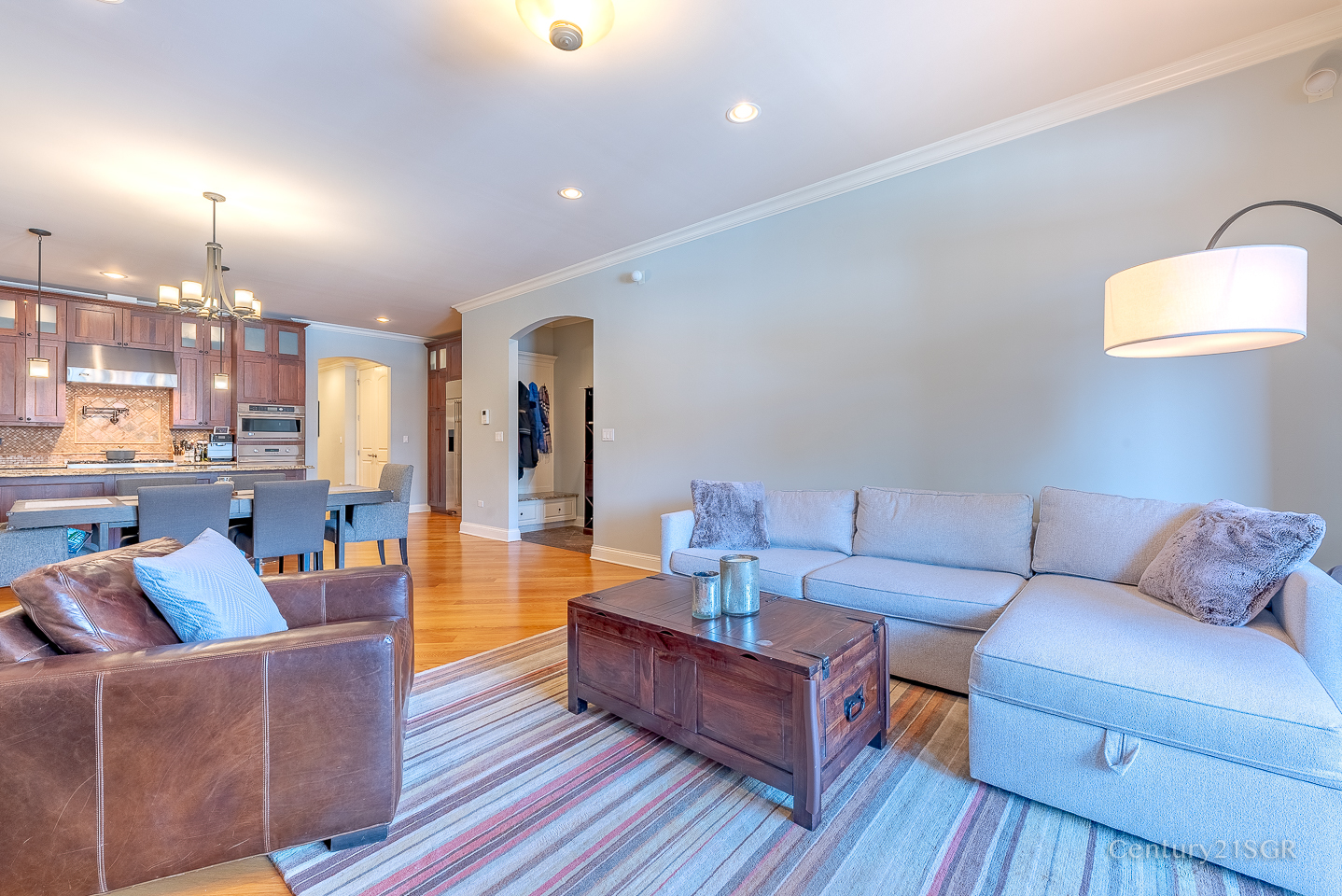 106 South Sangamon Street, Unit 2S Chicago, IL 60607 - Photo 6 of 29 a living room with furniture and wooden floor