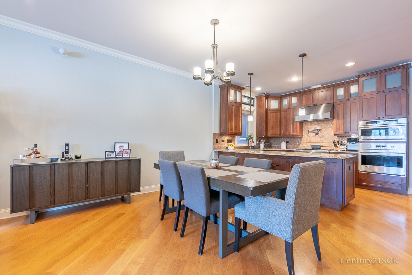 106 South Sangamon Street, Unit 2S Chicago, IL 60607 - Photo 10 of 29 a view of a dining room with furniture and wooden floor