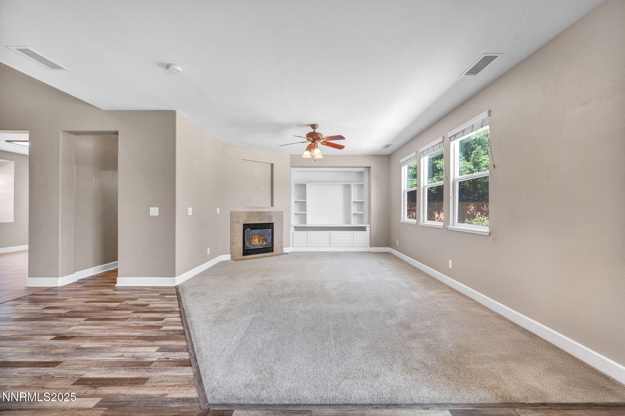 405 Sondrio Court Reno, NV 89521 - Photo 19 of 58 a view of an empty room with a window