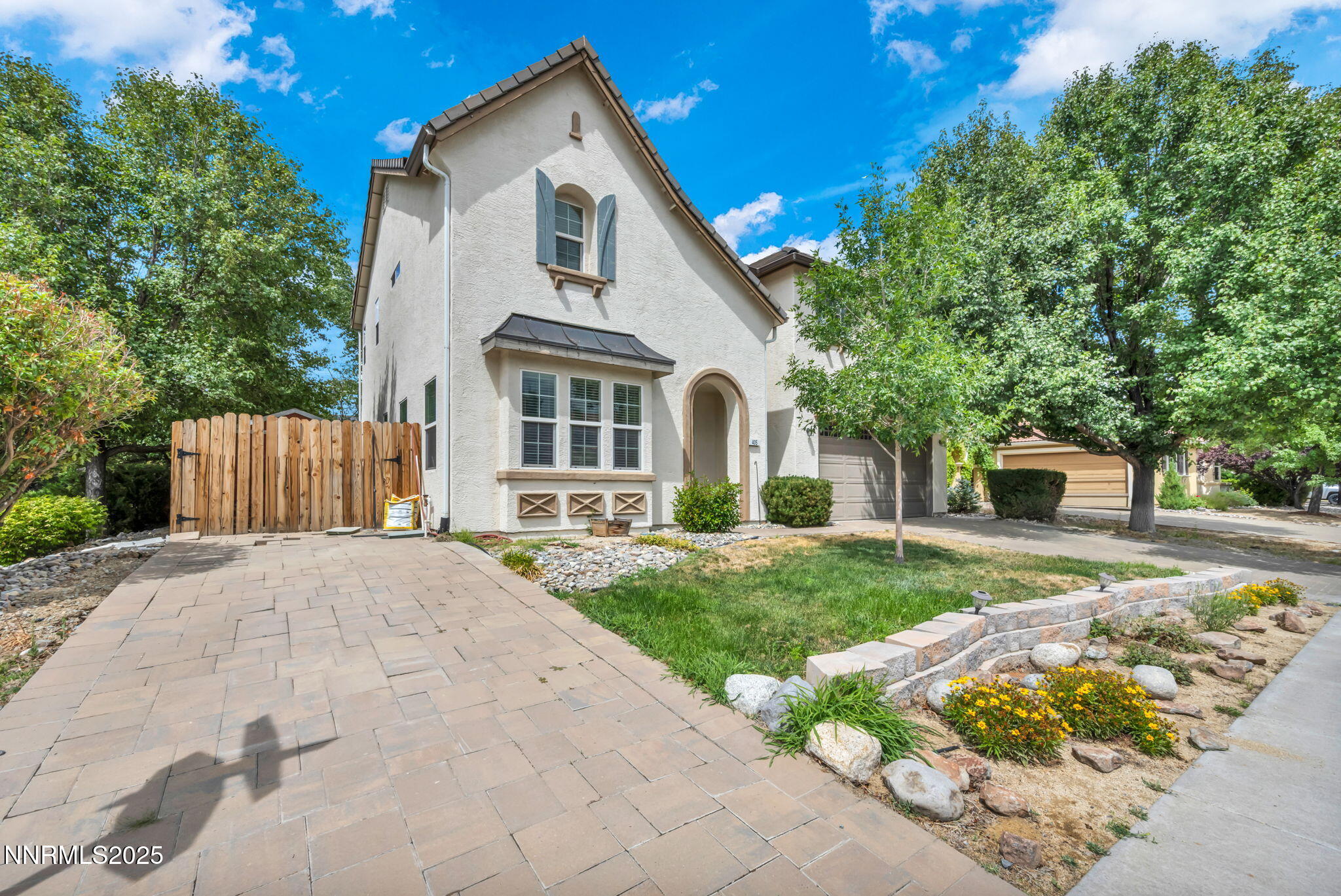 405 Sondrio Court Reno, NV 89521 - Photo 41 of 58 a view of a house with yard and a garden