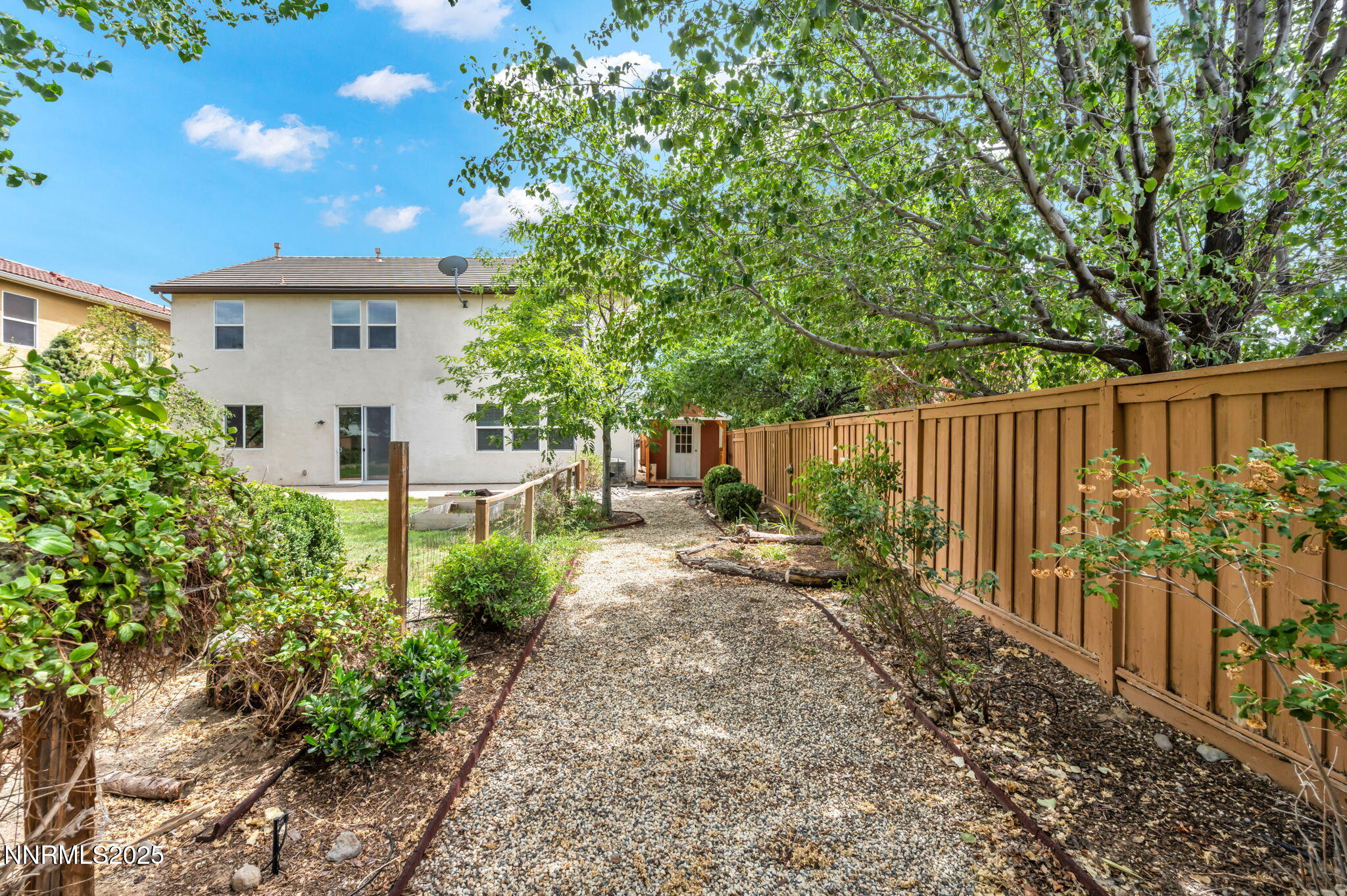 405 Sondrio Court Reno, NV 89521 - Photo 46 of 58 a view of a house with wooden fence
