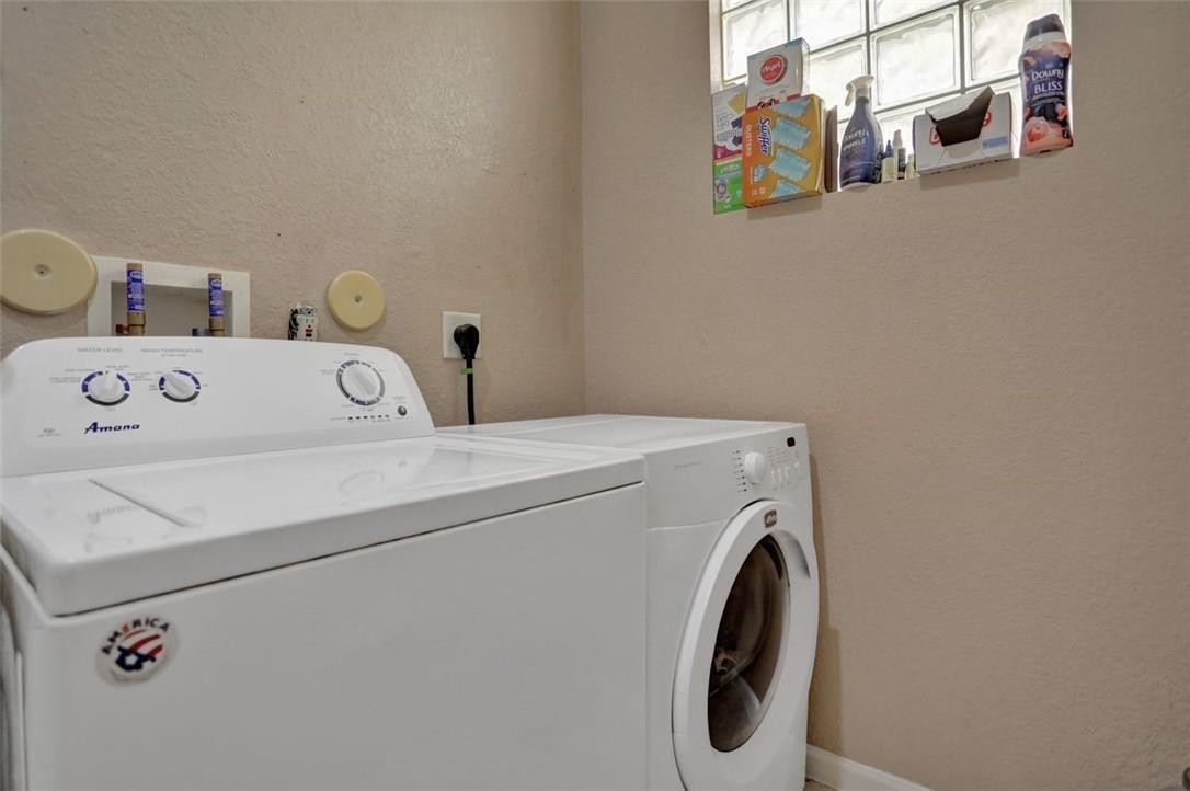 5257 Sancerre Circle Lake Worth, FL 33463 - Photo 25 of 46 a utility room with dryer and washer