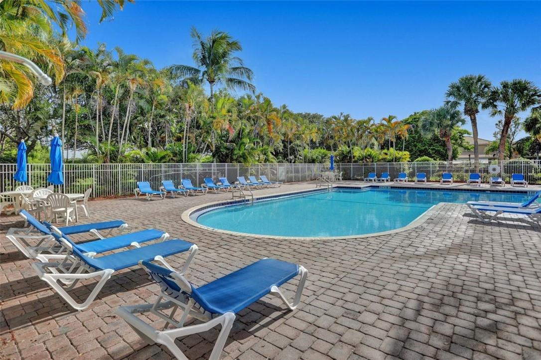 5257 Sancerre Circle Lake Worth, FL 33463 - Photo 43 of 46 a view of a swimming pool with a patio