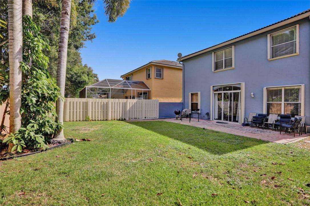 5257 Sancerre Circle Lake Worth, FL 33463 - Photo 6 of 46 a view of a house with backyard and sitting area