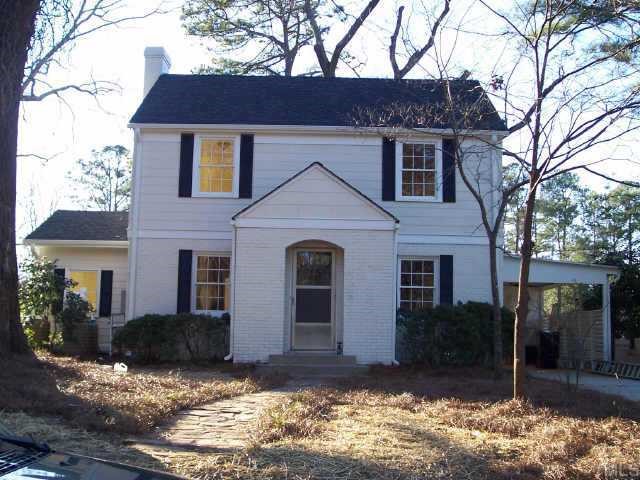 813 Chamberlain Street Raleigh, NC 27607 - Photo 1 of 9 a front view of a house with a yard