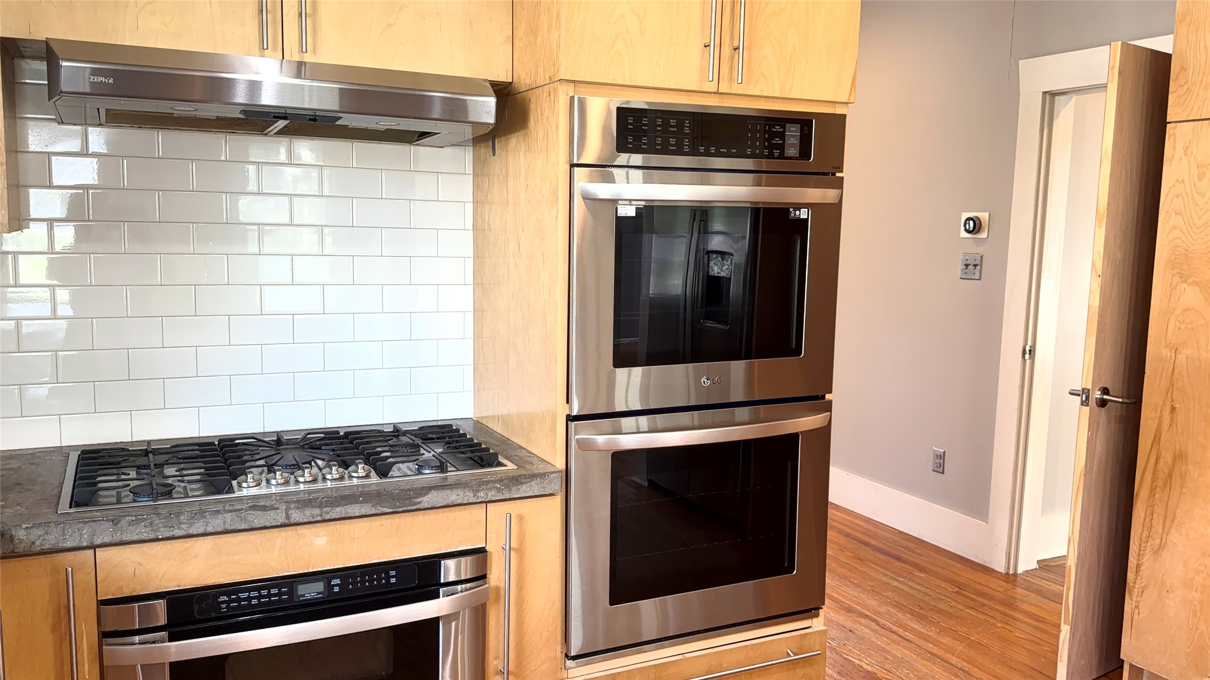 4530 Walker Street Houston, TX 77023 - Photo 10 of 17 a kitchen with stove and cabinets