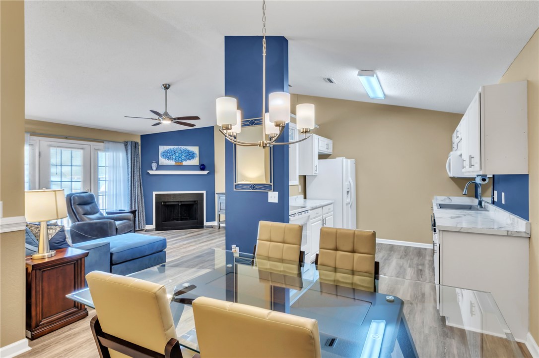 706 Pelham Square Way Greer, SC 29650 - Photo 1 of 20 This inviting space seamlessly connects the living area, dining, and kitchen for modern living.