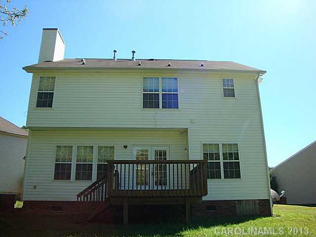 3741 Marbury Road Charlotte, NC 28269 - Photo 16 of 16 a front view of a house with a yard
