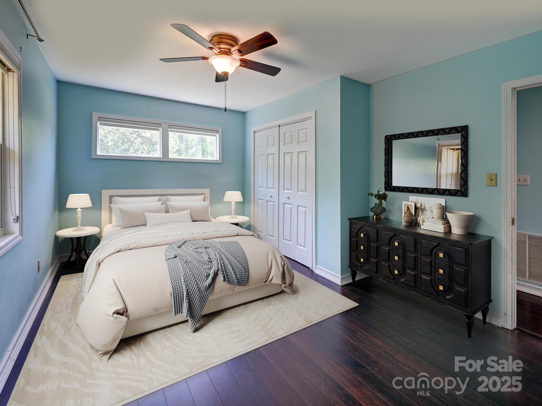 14 Spring Lake Drive Fletcher, NC 28732 - Photo 15 of 29 a bedroom with a bed and a flat screen tv