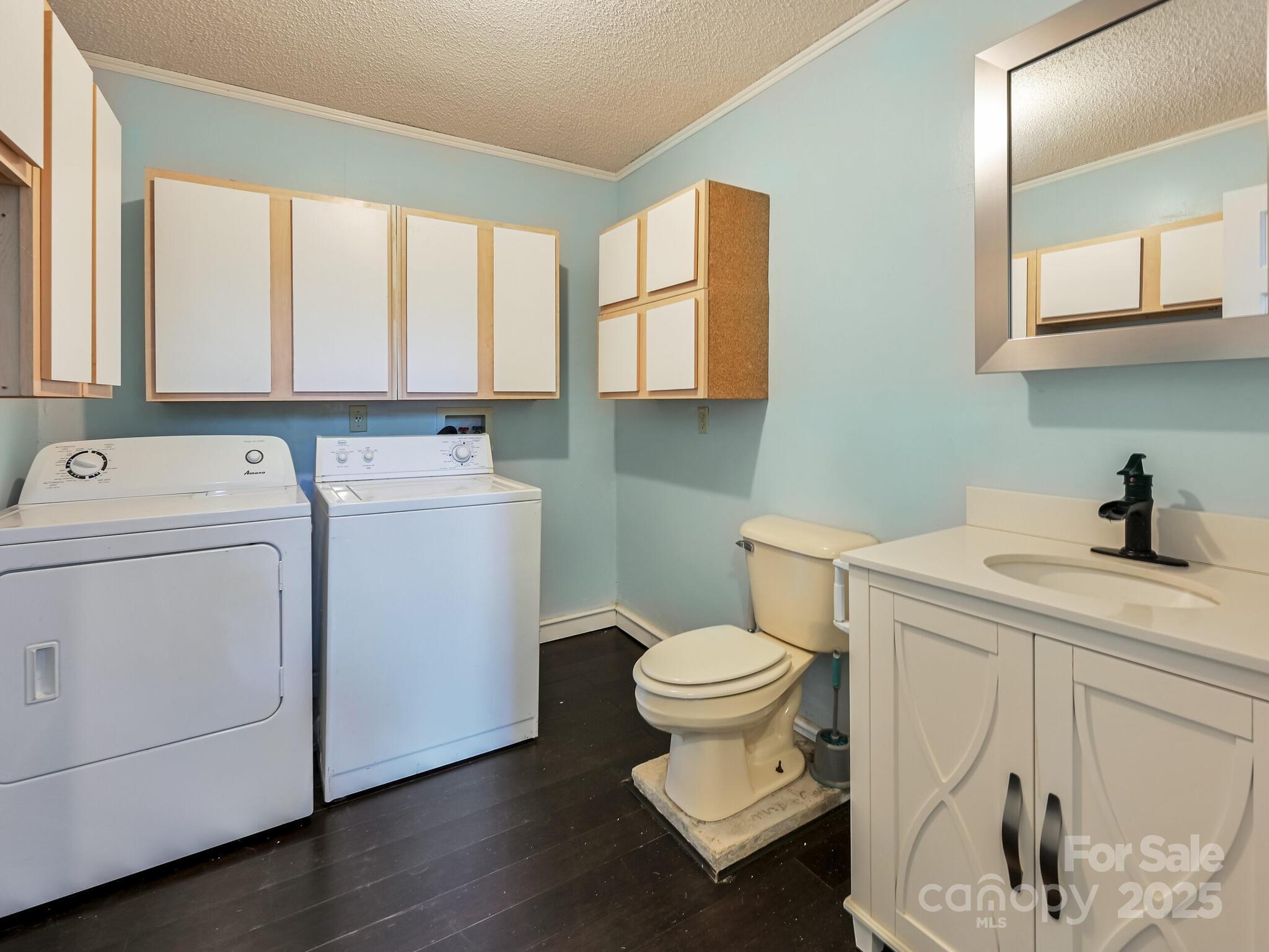 14 Spring Lake Drive Fletcher, NC 28732 - Photo 24 of 29 a bathroom with a sink toilet and a window