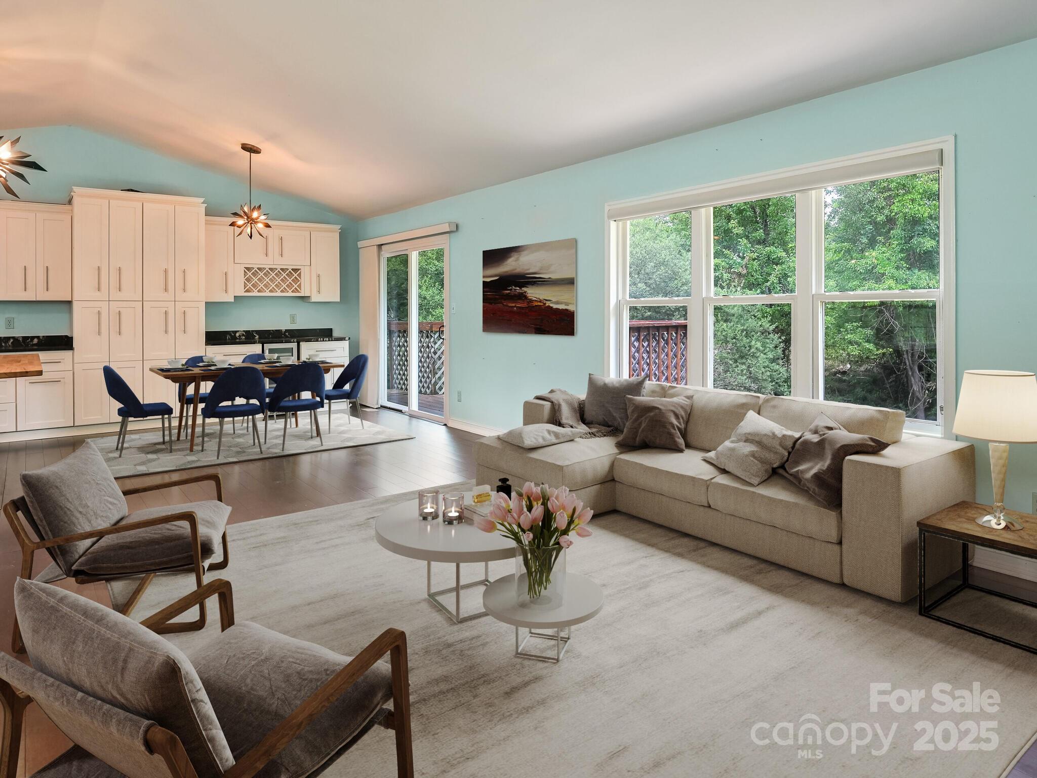 14 Spring Lake Drive Fletcher, NC 28732 - Photo 3 of 29 a living room with furniture and a flat screen tv