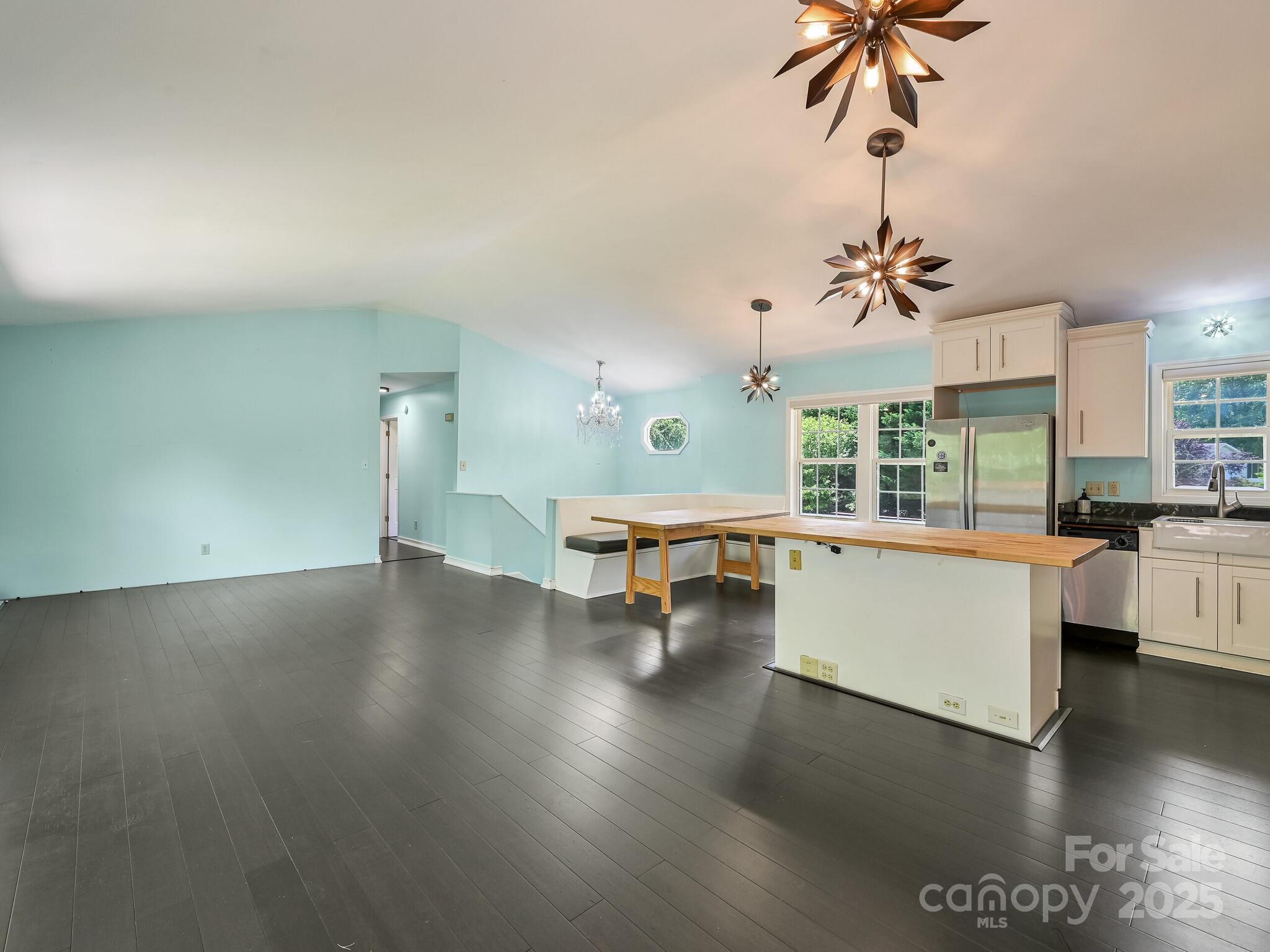 14 Spring Lake Drive Fletcher, NC 28732 - Photo 6 of 29 a room with lots of table chairs and a large window