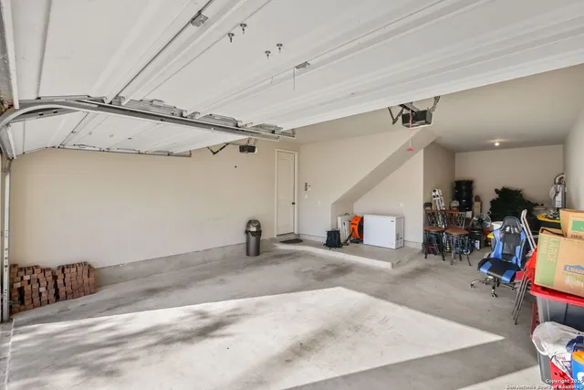 a view of a room with lots of gym equipment