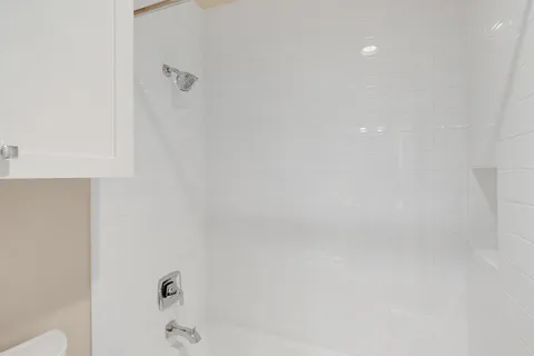 a bathroom with a bathtub