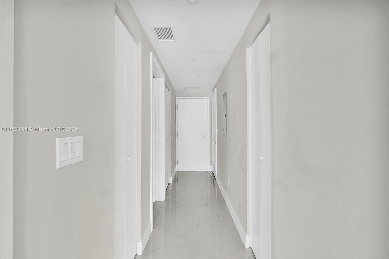 1010 Southwest 2nd Avenue, Unit 1004 Miami, FL 33130 - Photo 20 of 45 a view of a hallway with a white walls