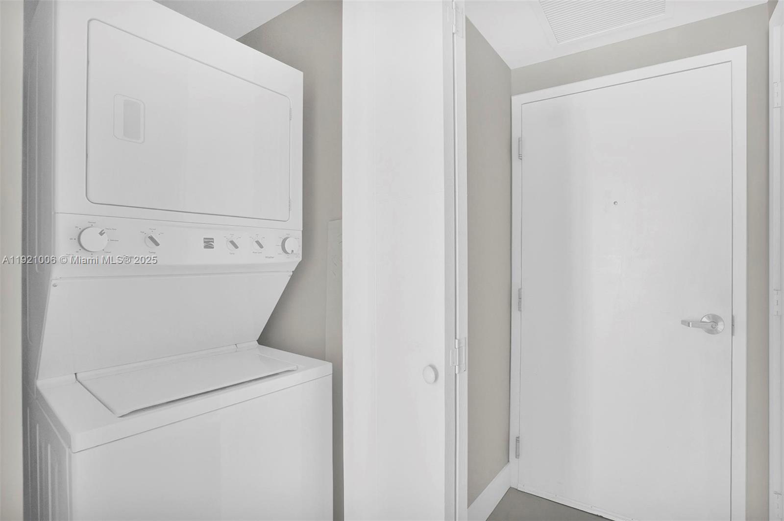 1010 Southwest 2nd Avenue, Unit 1004 Miami, FL 33130 - Photo 22 of 45 a utility room with dryer and washer