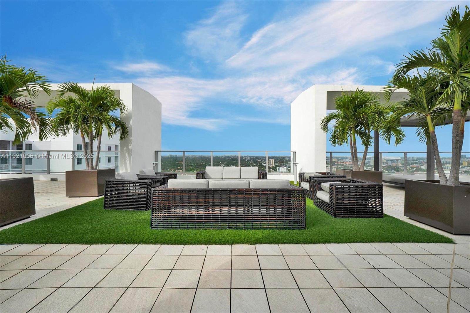 1010 Southwest 2nd Avenue, Unit 1004 Miami, FL 33130 - Photo 29 of 45 a view of a chairs and table of the house