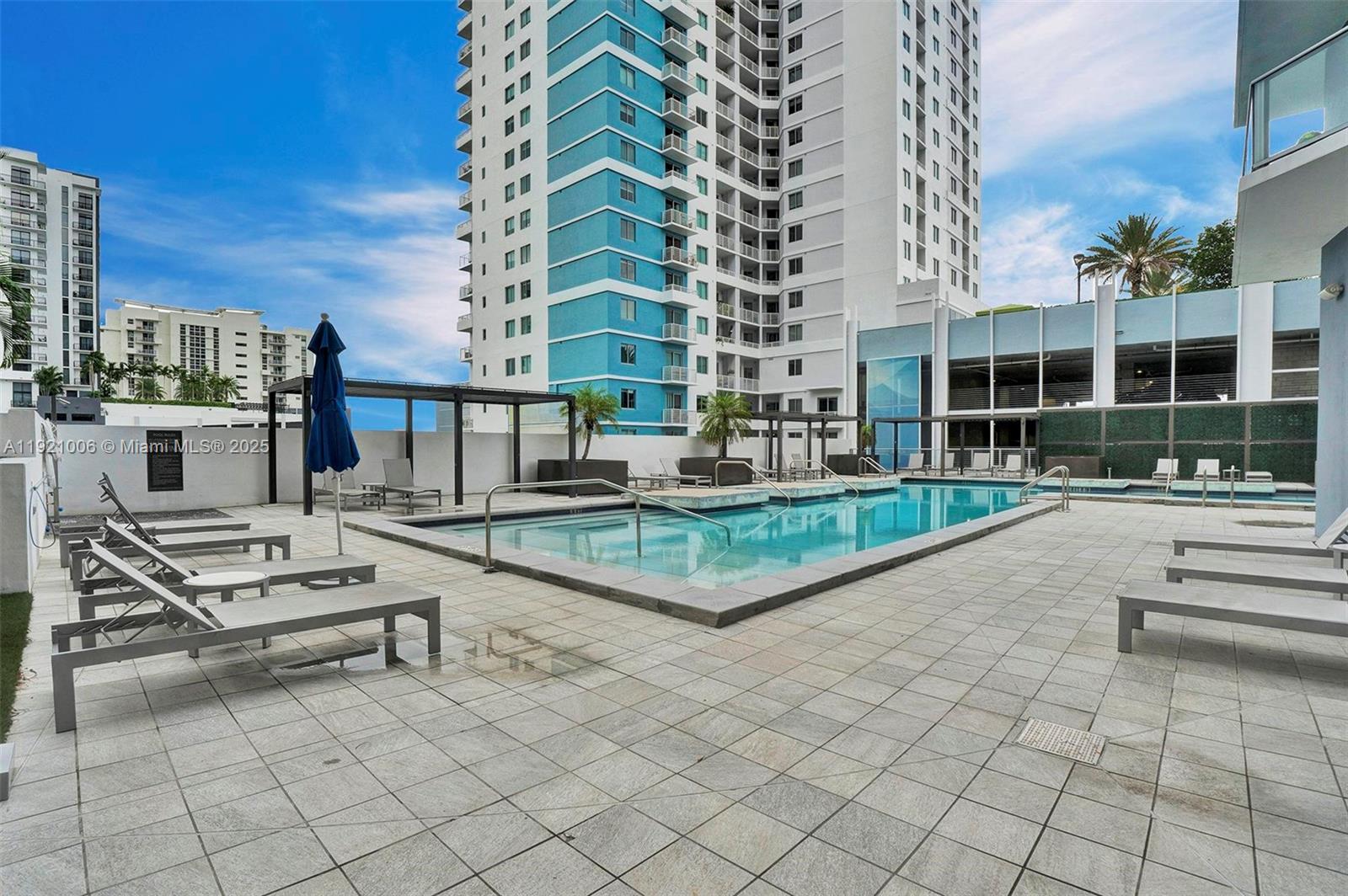 1010 Southwest 2nd Avenue, Unit 1004 Miami, FL 33130 - Photo 36 of 45 a view of pool with outdoor seating
