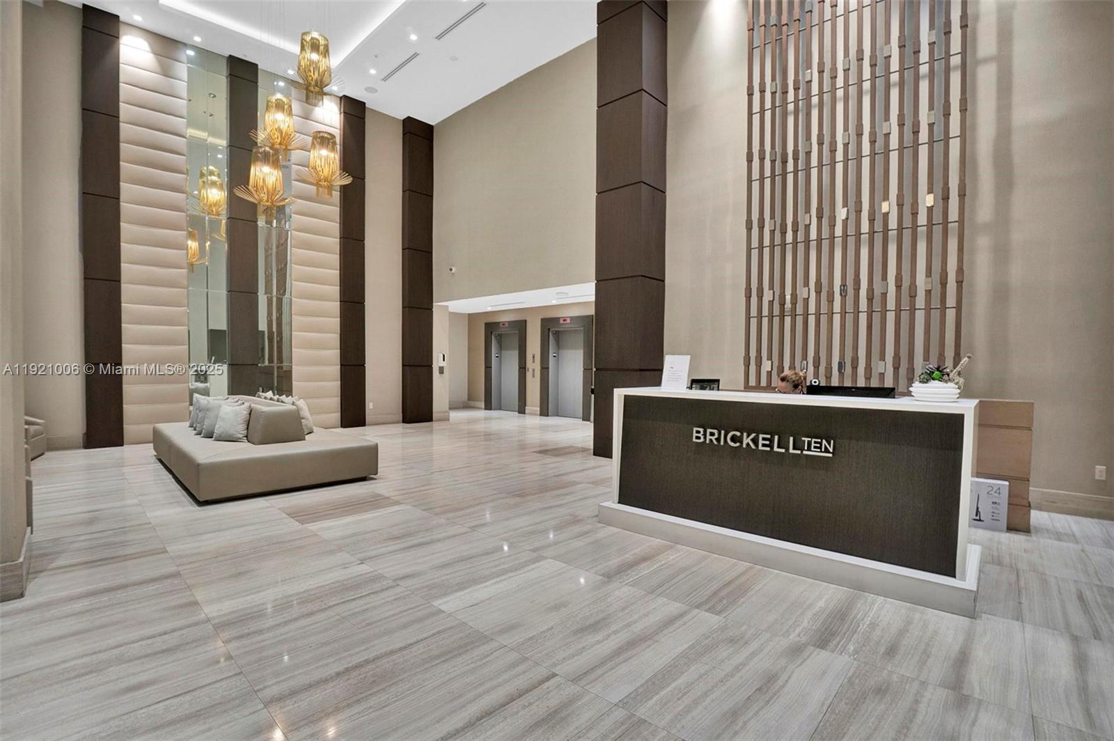 1010 Southwest 2nd Avenue, Unit 1004 Miami, FL 33130 - Photo 41 of 45 a view of a spacious bedroom with furniture and large windows