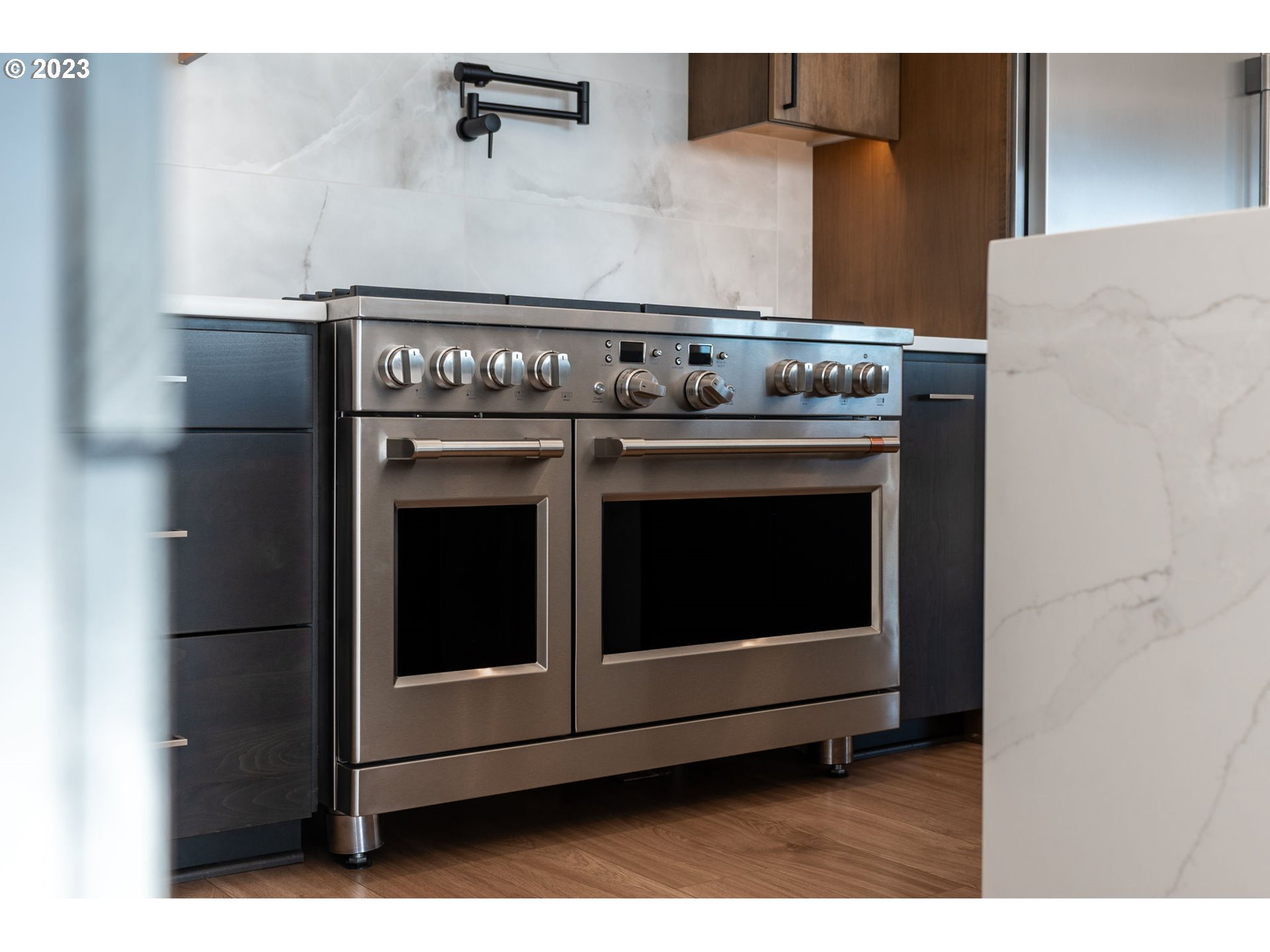 6622 Southeast Riverside Drive Vancouver, WA 98661 - Photo 11 of 46 a stove top oven sitting inside of a kitchen