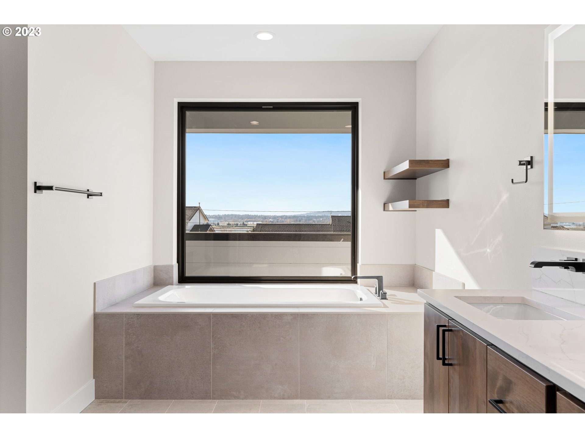 6622 Southeast Riverside Drive Vancouver, WA 98661 - Photo 27 of 46 a bathroom with a sink and a mirror