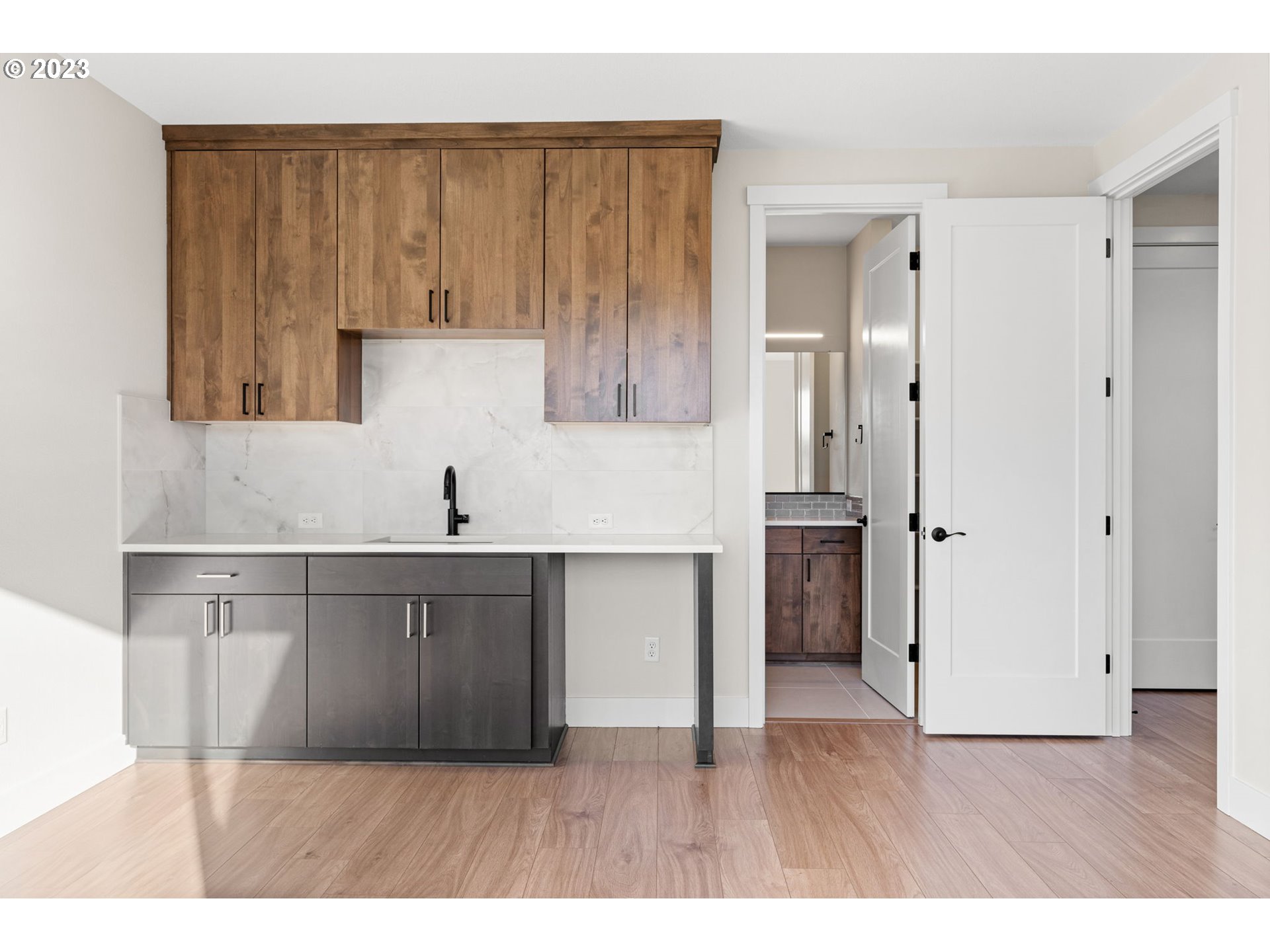 6622 Southeast Riverside Drive Vancouver, WA 98661 - Photo 40 of 46 a kitchen with a refrigerator sink and cabinets