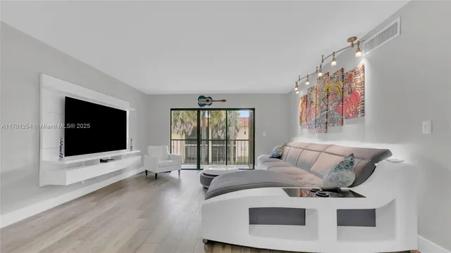 $355,000 | 327 Lakeview Drive, Unit 203, Weston, FL 33326