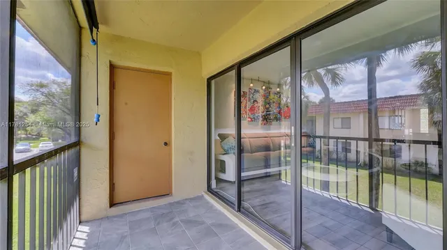 $355,000 | 327 Lakeview Drive, Unit 203, Weston, FL 33326