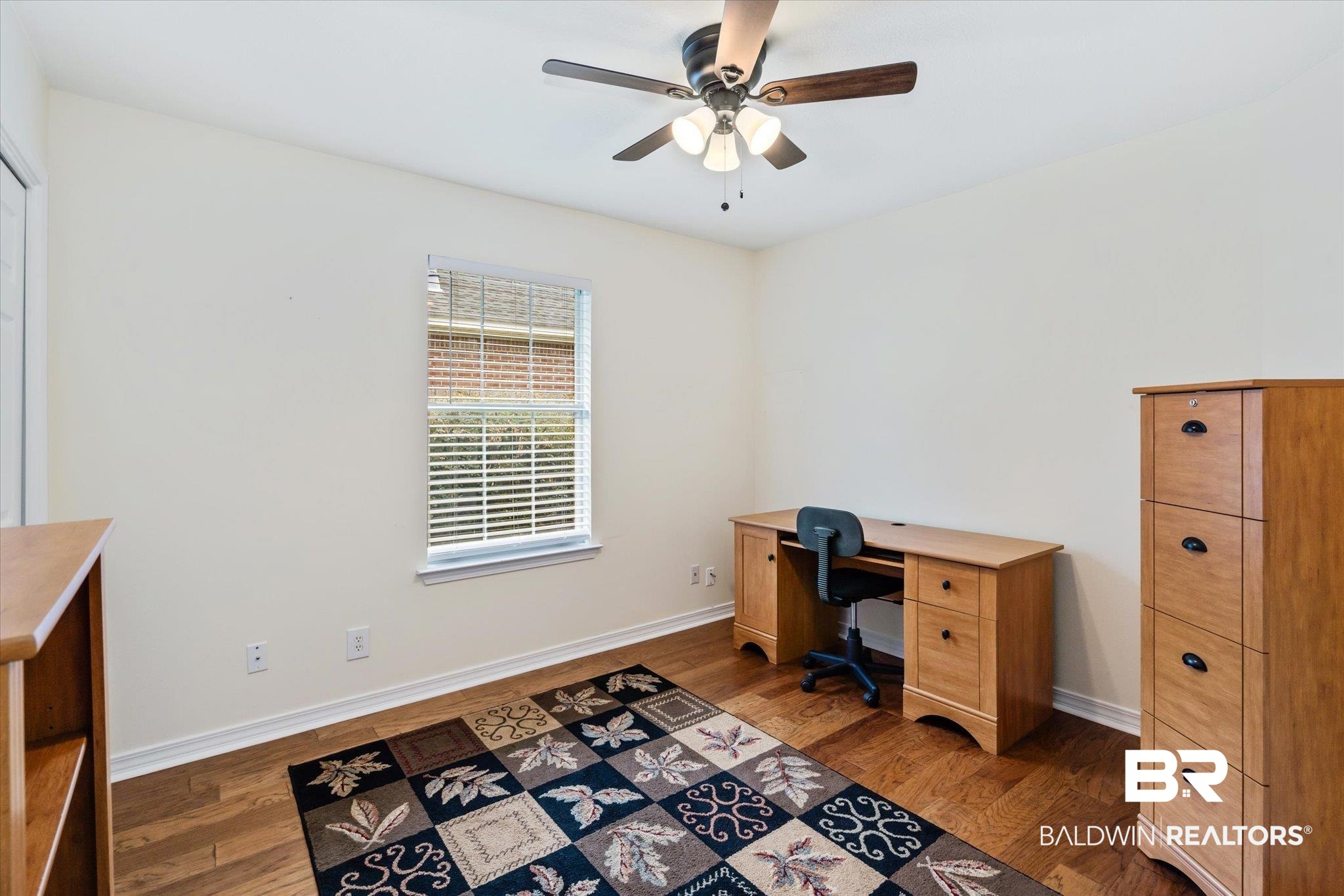 7236 Highpointe Place East Daphne, AL 36527 - Photo 19 of 32 Home office with dark wood-type flooring and ceiling fan