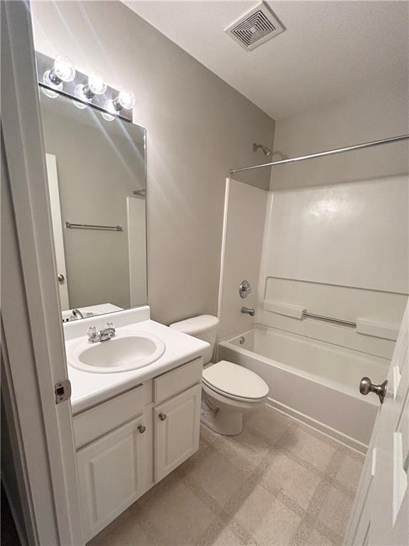 3647 Postwaite Circle Northwest Duluth, GA 30097 - Photo 17 of 20 a bathroom with a double vanity sink a toilet a mirror and shower