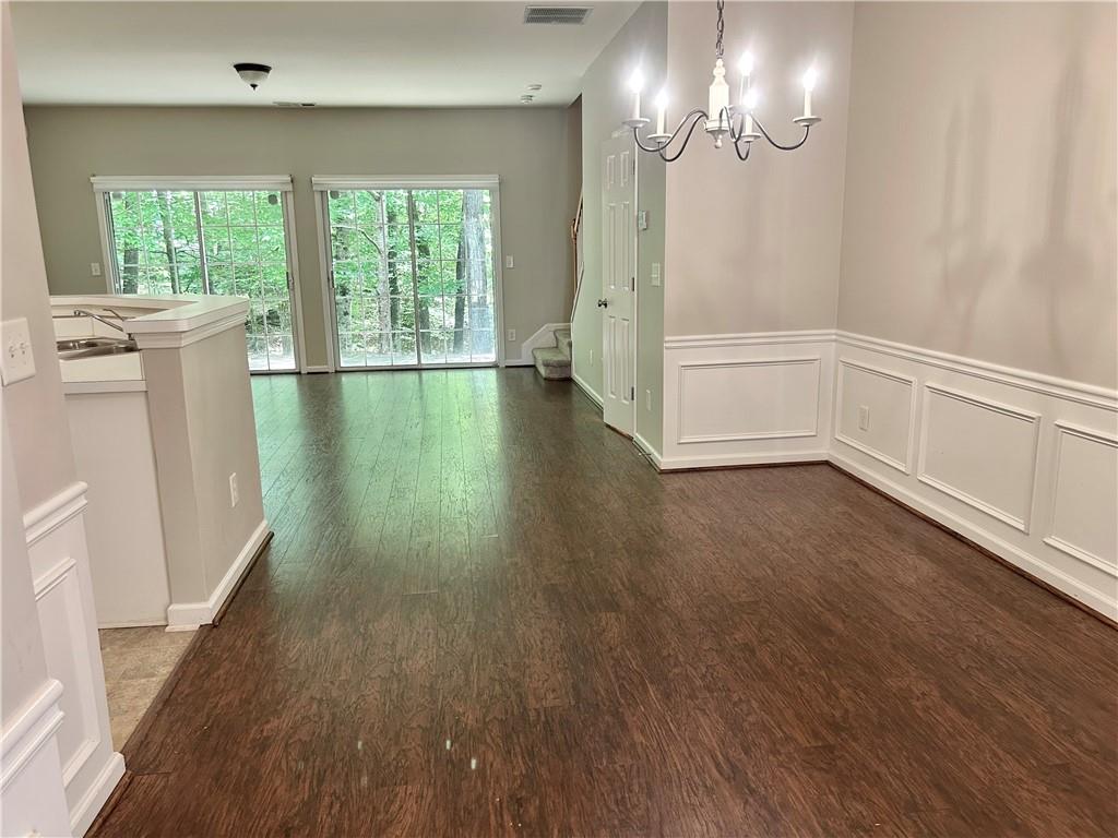 3647 Postwaite Circle Northwest Duluth, GA 30097 - Photo 2 of 20 a view of empty room with wooden floor and fan