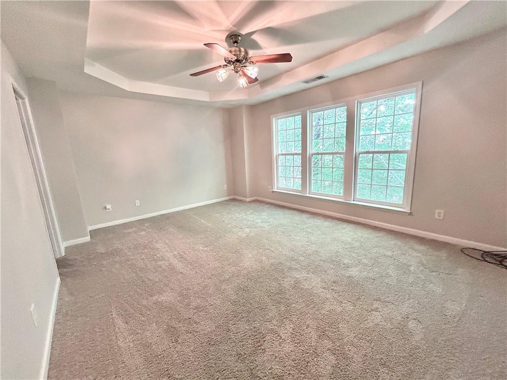 3647 Postwaite Circle Northwest Duluth, GA 30097 - Photo 9 of 20 a view of an empty room with a window