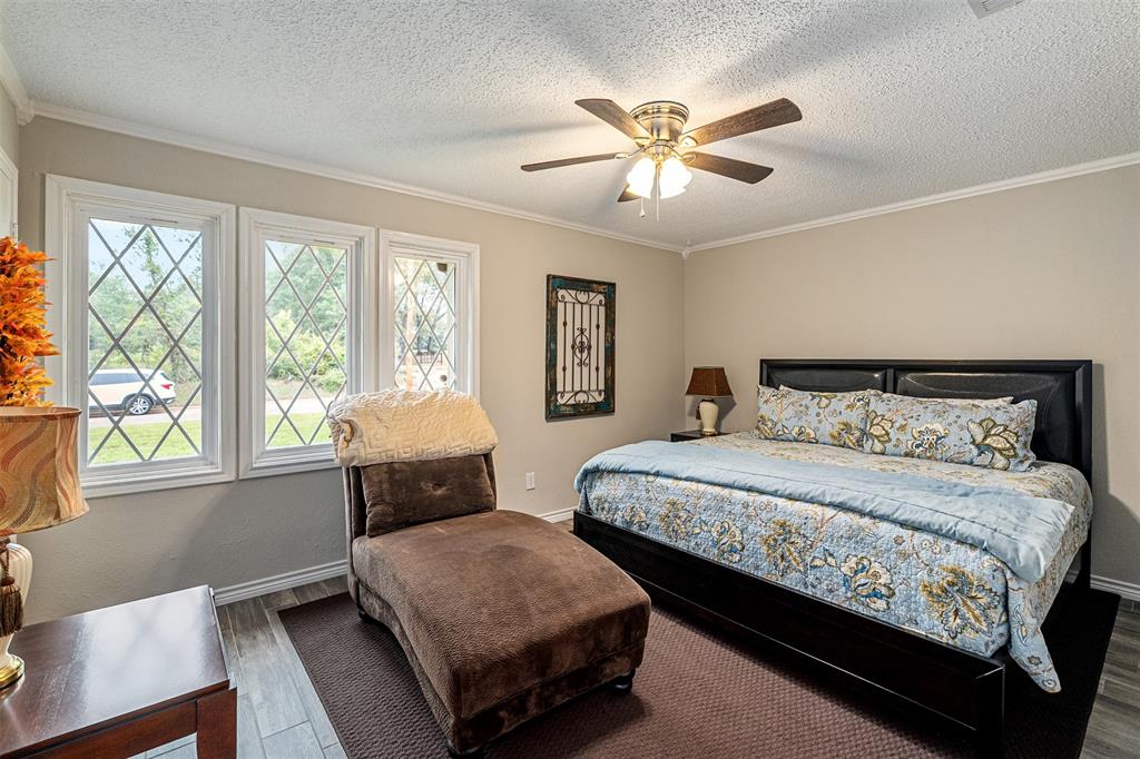 1102 Mill Run Road Athens, TX 75751 - Photo 23 of 35 a bedroom with bed and window