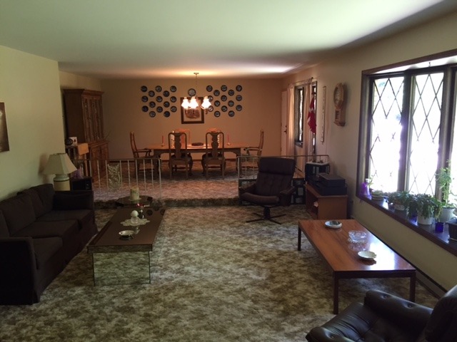 6615 Kemman Road Hebron, IL 60034 - Photo 12 of 25 a living room with furniture and a large window