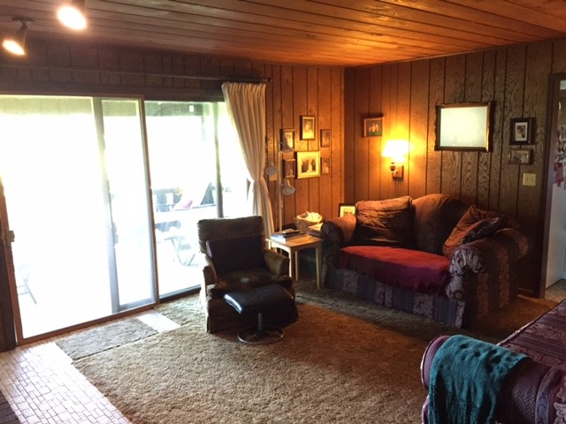 6615 Kemman Road Hebron, IL 60034 - Photo 15 of 25 a living room with furniture and a rug