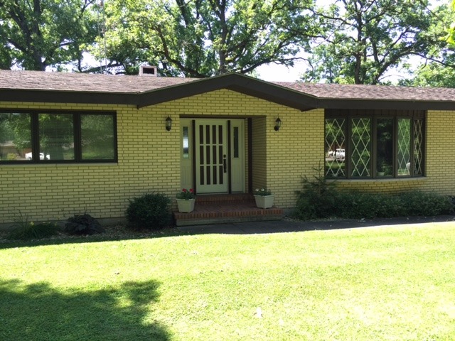 6615 Kemman Road Hebron, IL 60034 - Photo 25 of 25 a front view of a house with a yard