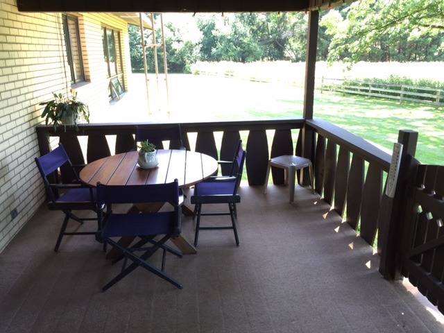 6615 Kemman Road Hebron, IL 60034 - Photo 9 of 25 a view of a dining room with furniture window and wooden floor