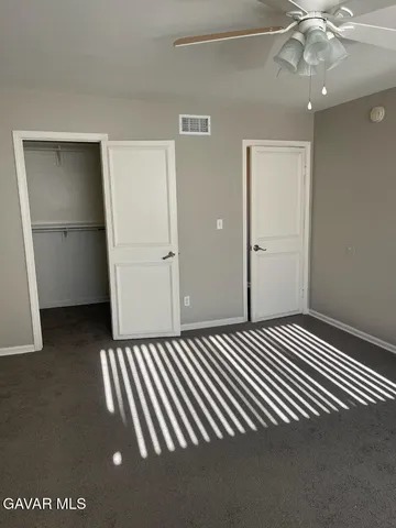 a view of a livingroom with a staircase