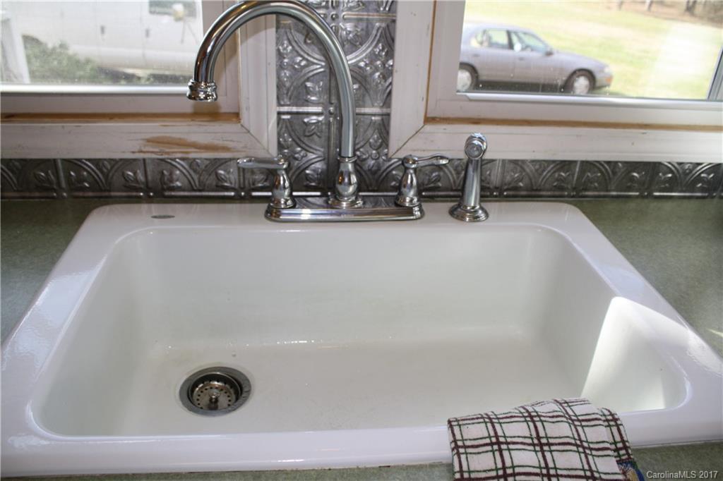 1460 Needmore Road Woodleaf, NC 27054 - Photo 3 of 16 a bathroom with a tub