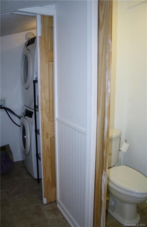 1460 Needmore Road Woodleaf, NC 27054 - Photo 6 of 16 a bathroom with a toilet and a shower