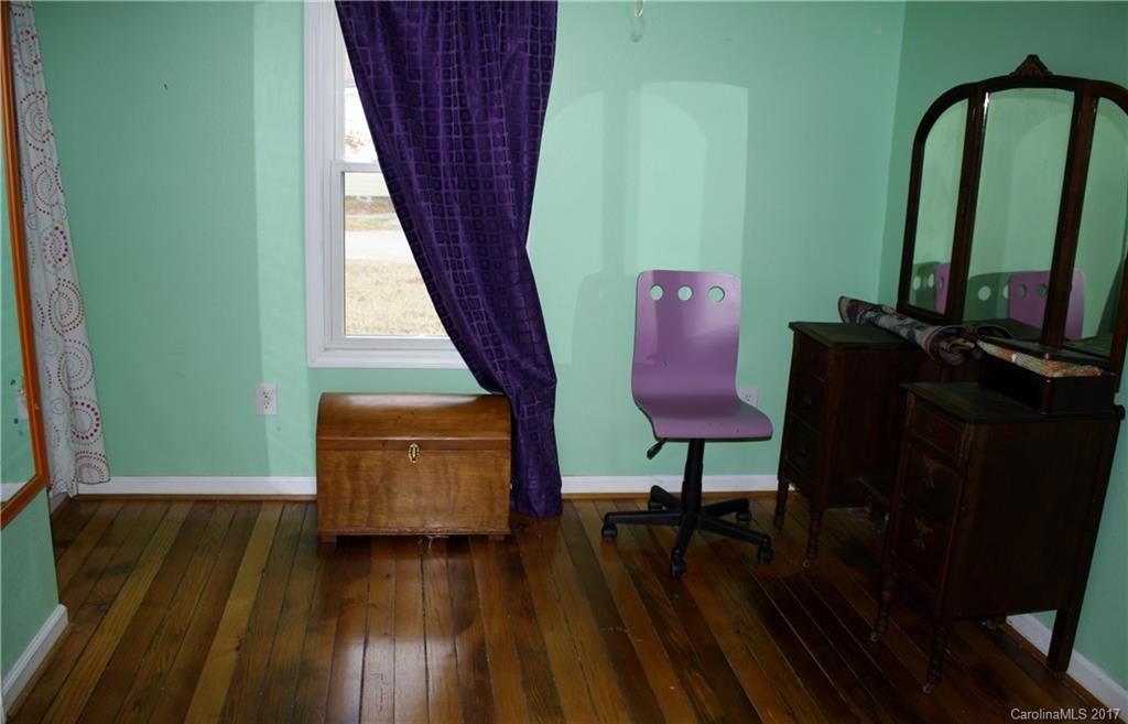 1460 Needmore Road Woodleaf, NC 27054 - Photo 7 of 16 a room with furniture and wooden floor