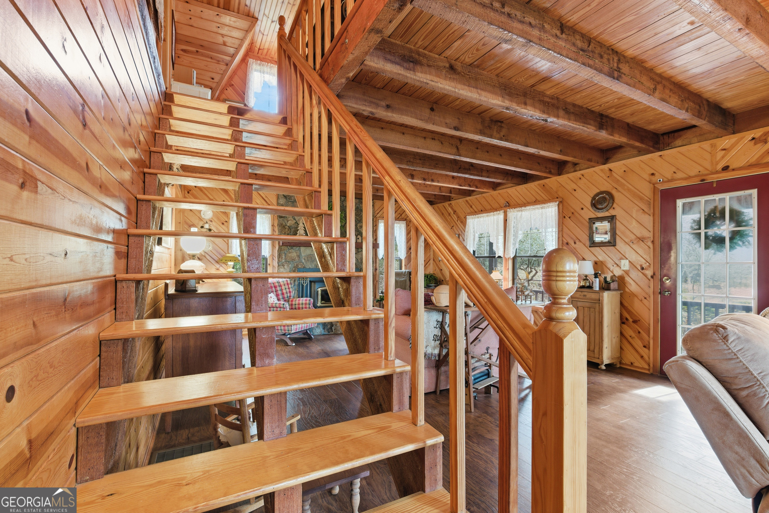 801 Sillycook Trail Clarkesville, GA 30523 - Photo 20 of 47 a view of balcony with wooden floor and stairs