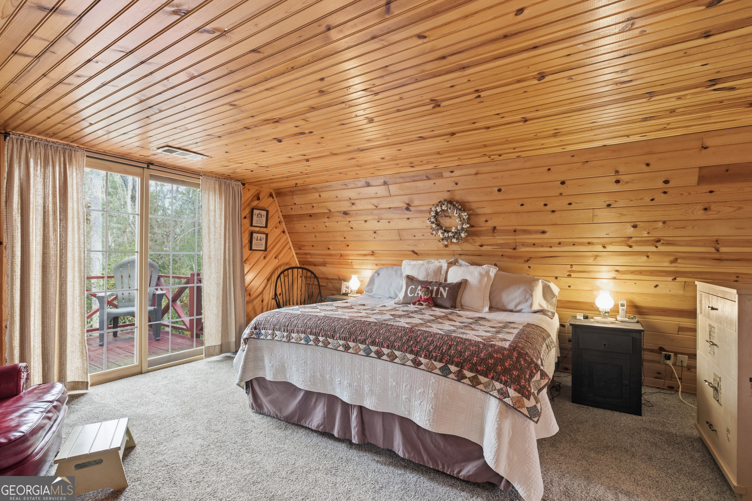 801 Sillycook Trail Clarkesville, GA 30523 - Photo 22 of 47 a bedroom with a bed and wooden floor