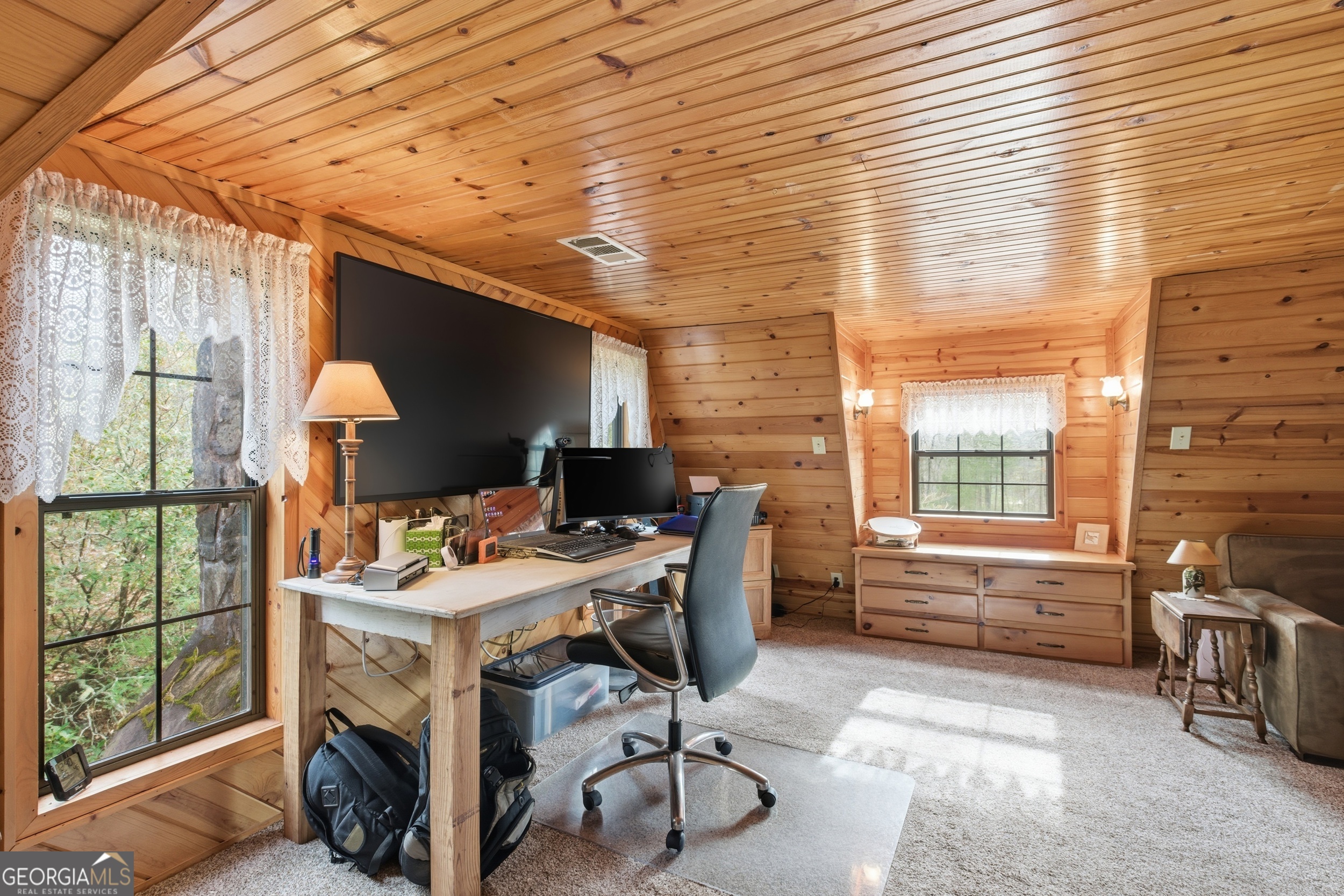 801 Sillycook Trail Clarkesville, GA 30523 - Photo 30 of 47 a view of a workspace with furniture and a window