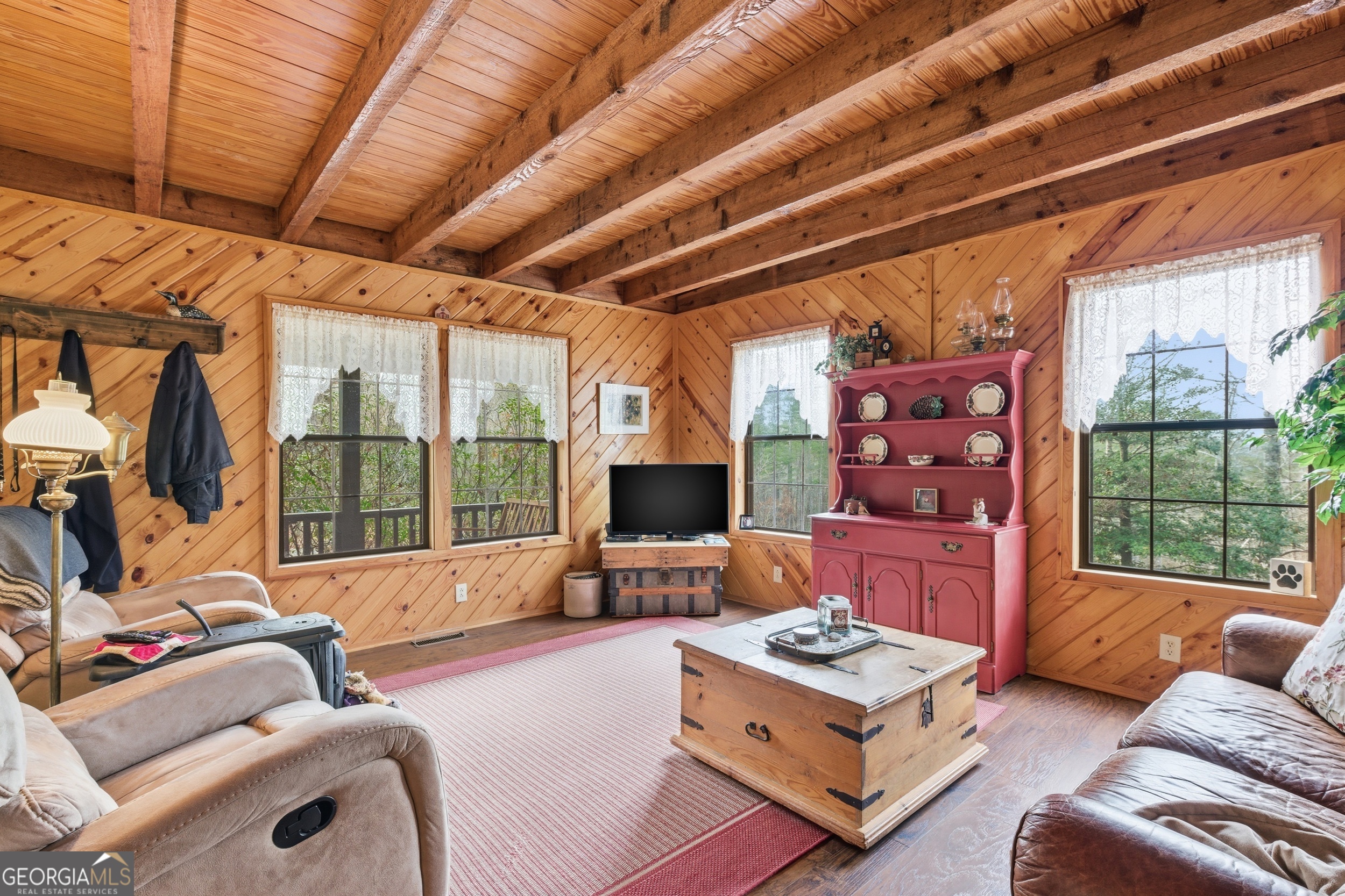 801 Sillycook Trail Clarkesville, GA 30523 - Photo 8 of 47 a living room with furniture and a fireplace