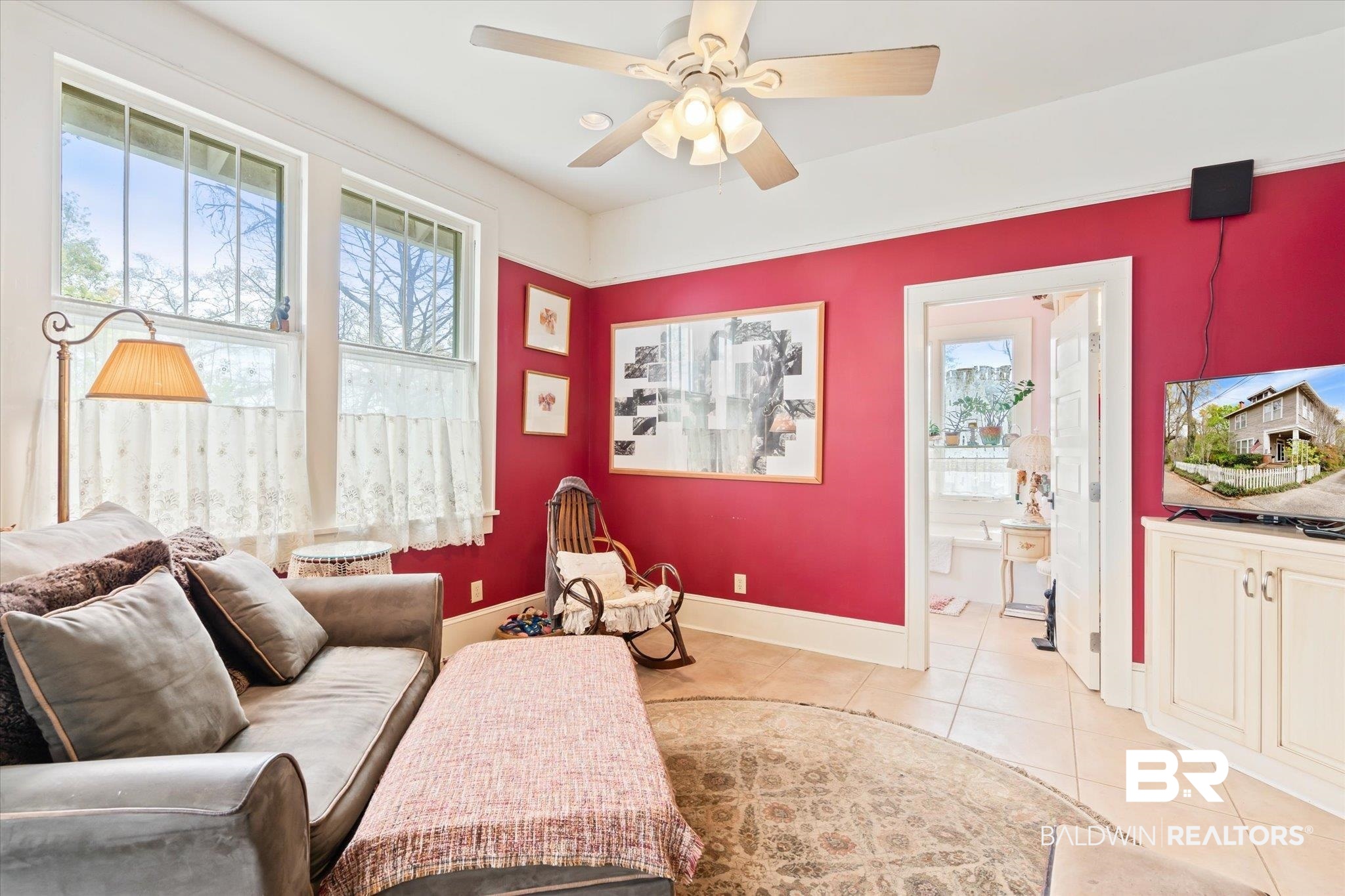12 Lebaron Street Mobile, AL 36602 - Photo 18 of 37 Tiled living room with ceiling fan and plenty of natural light
