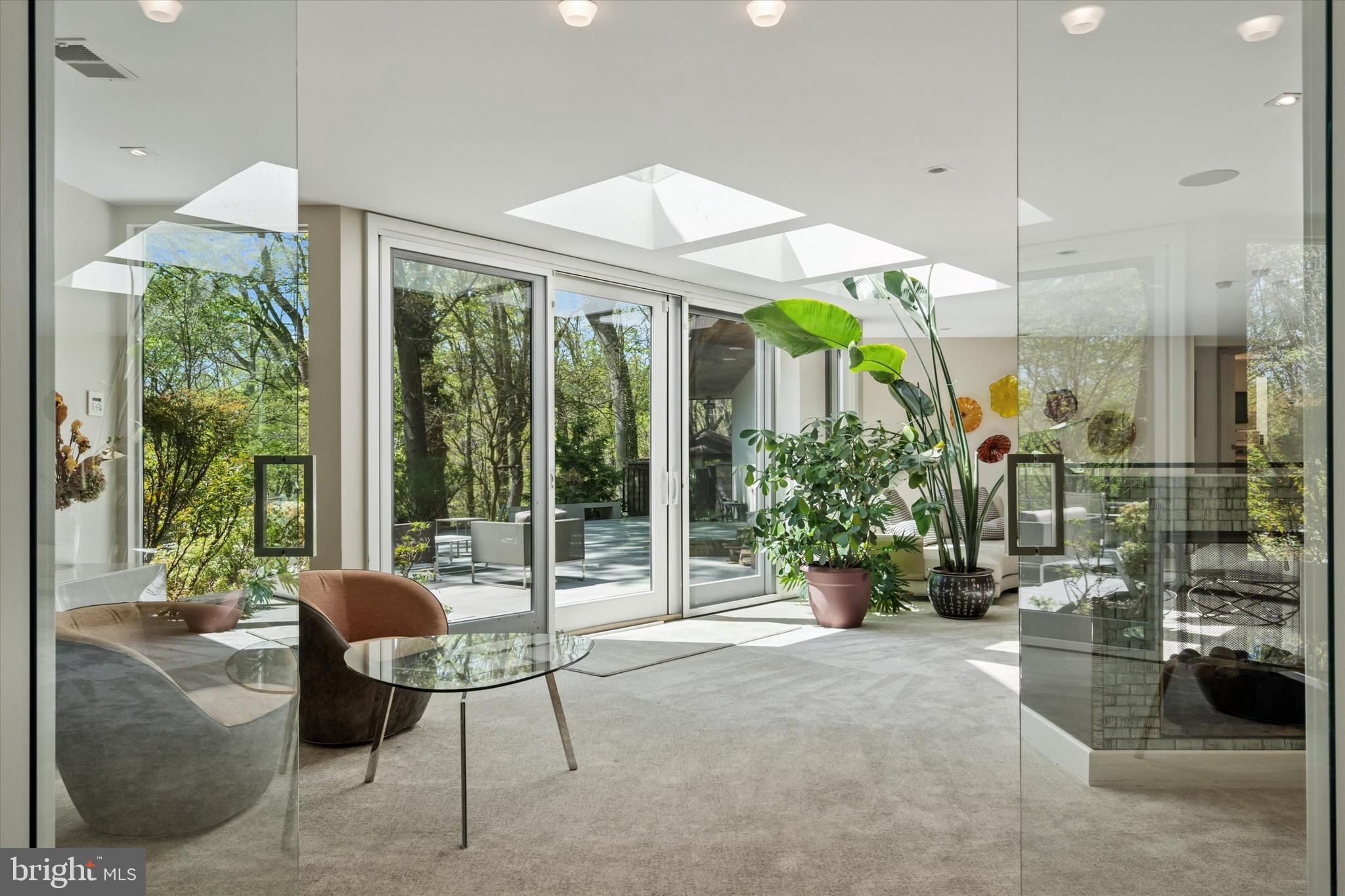 4126 Apalogen Road Philadelphia, PA 19129 - Photo 11 of 75 a view of a patio with couches and potted plants